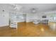 Living Room with hardwood floors, spiral staircase, and water views at 30 Dolphin Dr, Treasure Island, FL 33706