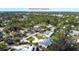 Aerial shot showing the home's location within a lush, green neighborhood near Downtown Sarasota at 4151 Olive Ave, Sarasota, FL 34231