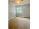 Spacious bedroom with neutral walls and ceiling fan at 7639 Dolonita Dr # 7639, Tampa, FL 33615