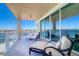 Expansive balcony featuring comfortable lounge furniture with lovely water views at 800 Collany Rd # 605 & 606, Tierra Verde, FL 33715