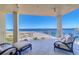 Relaxing balcony with comfortable seating and breathtaking ocean views at 800 Collany Rd # 605 & 606, Tierra Verde, FL 33715