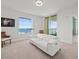 Cozy bedroom with a comfortable white couch, stunning ocean views, and a telescope for stargazing at 800 Collany Rd # 605 & 606, Tierra Verde, FL 33715