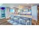 Spacious gourmet kitchen with sleek cabinetry, quartz countertops, and a large island with bar seating at 800 Collany Rd # 605 & 606, Tierra Verde, FL 33715