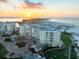 Luxury beachfront condo building with sunset views at 800 Collany Rd # 605 & 606, Tierra Verde, FL 33715