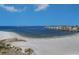 Aerial view of waterfront homes and sandy beach at 800 Collany Rd # 605 & 606, Tierra Verde, FL 33715