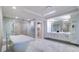 Spa-like bathroom with soaking tub and walk-in shower at 800 Collany Rd # 605 & 606, Tierra Verde, FL 33715