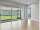 Dining area with sliding glass doors leading to a backyard patio at 12430 Hearts Ease St, Venice, FL 34293