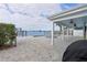 Covered patio with pool and spa, waterfront view at 14227 E Parsley Dr, Madeira Beach, FL 33708