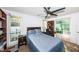 Bright bedroom with double bed and built in shelving at 1609 Lakeview Rd, Clearwater, FL 33756