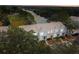 Aerial view of townhouses with surrounding landscape at 2345 Lake Woodberry Cir, Brandon, FL 33510
