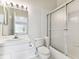 Bathroom features a shower/tub combo and updated vanity at 2345 Lake Woodberry Cir, Brandon, FL 33510