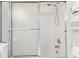 Shower with sliding glass door and tiled walls at 2345 Lake Woodberry Cir, Brandon, FL 33510