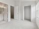 Empty bedroom with ensuite bathroom and closet at 2345 Lake Woodberry Cir, Brandon, FL 33510