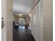 The foyer features a closet, hard flooring and a view of the living room at 2595 Cyprus Dr # 4-202, Palm Harbor, FL 34684