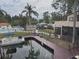 Waterfront view with private dock and community pool at 2595 Cyprus Dr # 4-202, Palm Harbor, FL 34684