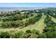 Aerial view of the golf course and surrounding area at 2700 Cove Cay Dr # 3F, Clearwater, FL 33760