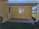 Covered back patio with concrete flooring at 3141 Ludlow Dr, New Port Richey, FL 34655