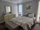Serene bedroom with neutral tones and a comfortable bed at 3141 Ludlow Dr, New Port Richey, FL 34655