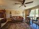 Cozy living room with hardwood floors and a comfortable sofa at 3141 Ludlow Dr, New Port Richey, FL 34655