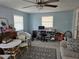 Home office with a desk and comfortable seating area at 3141 Ludlow Dr, New Port Richey, FL 34655