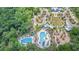 Community pool, playground, and clubhouse at 4492 Tuner Bnd, Land O Lakes, FL 34638