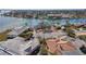 An aerial view of a single-Gathering home nestled in a quiet waterfront community at 485 41St Ave, St Pete Beach, FL 33706