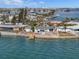 Aerial view of waterfront home with private dock and lush landscaping at 485 41St Ave, St Pete Beach, FL 33706
