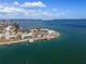 Aerial view of waterfront home with private dock and beautiful water views at 485 41St Ave, St Pete Beach, FL 33706