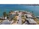 Aerial view of waterfront home on a secluded island with a private dock at 485 41St Ave, St Pete Beach, FL 33706