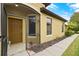 Inviting front entry with screened door and decorative accents at 5641 Sunset Falls Dr, Apollo Beach, FL 33572