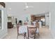 Bright kitchen, dining area, and living room with tile floors at 5641 Sunset Falls Dr, Apollo Beach, FL 33572