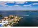 Aerial view of home's waterfront location and surroundings at 825 116Th Ave, Treasure Island, FL 33706