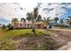 Single story home with palm tree at 825 116Th Ave, Treasure Island, FL 33706