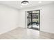 Dining area with sliding doors leading to screened patio at 9313 Ripley Rd, Thonotosassa, FL 33592