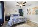 Relaxing bedroom with king-size bed, navy blue bedding, and calming decor at 946 23Rd S Ave, St Petersburg, FL 33705