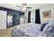 Bright bedroom with king-size bed, ceiling fan, and built-in dresser at 946 23Rd S Ave, St Petersburg, FL 33705
