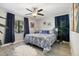 Spacious bedroom with king-size bed, navy blue accents, and ample natural light at 946 23Rd S Ave, St Petersburg, FL 33705