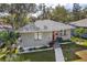 Gray house with landscaped yard and walkway at 946 23Rd S Ave, St Petersburg, FL 33705