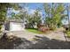 Detached garage with driveway and landscaping at 946 23Rd S Ave, St Petersburg, FL 33705