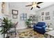 Bright home office features built-in shelving, a comfortable armchair, and a work desk at 946 23Rd S Ave, St Petersburg, FL 33705