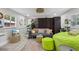 Cozy living room with gray sofa, beanbag chair, and multi-colored rug at 946 23Rd S Ave, St Petersburg, FL 33705