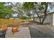 Private backyard oasis with a hammock and fire pit at 1161 Howard St, Clearwater, FL 33756