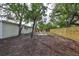 Spacious backyard with two hammocks and a fire pit at 1161 Howard St, Clearwater, FL 33756