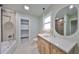 Updated bathroom with a modern vanity and walk-in shower at 1161 Howard St, Clearwater, FL 33756