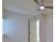 Simple bedroom with ceiling fan and access to hallway at 1161 Howard St, Clearwater, FL 33756