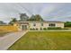 Charming single-story house with a well-manicured lawn and modern updates at 1161 Howard St, Clearwater, FL 33756
