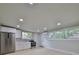 Modern kitchen with stainless steel appliances and white cabinets at 1161 Howard St, Clearwater, FL 33756