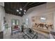 Open living and dining area with vaulted ceiling, hardwood floors, and stylish decor at 1161 Howard St, Clearwater, FL 33756