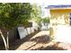 Backyard with wooden fence and storage in the shade at 12663 Eddington Rd, Spring Hill, FL 34609