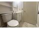 Small bathroom with white vanity and toilet at 12663 Eddington Rd, Spring Hill, FL 34609